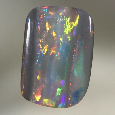 SOLID SEMI BLACK OPAL Fire display showing bands of colour 